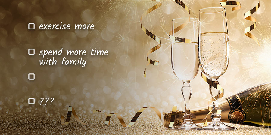 image of two champagne glasses clinking on New Years'